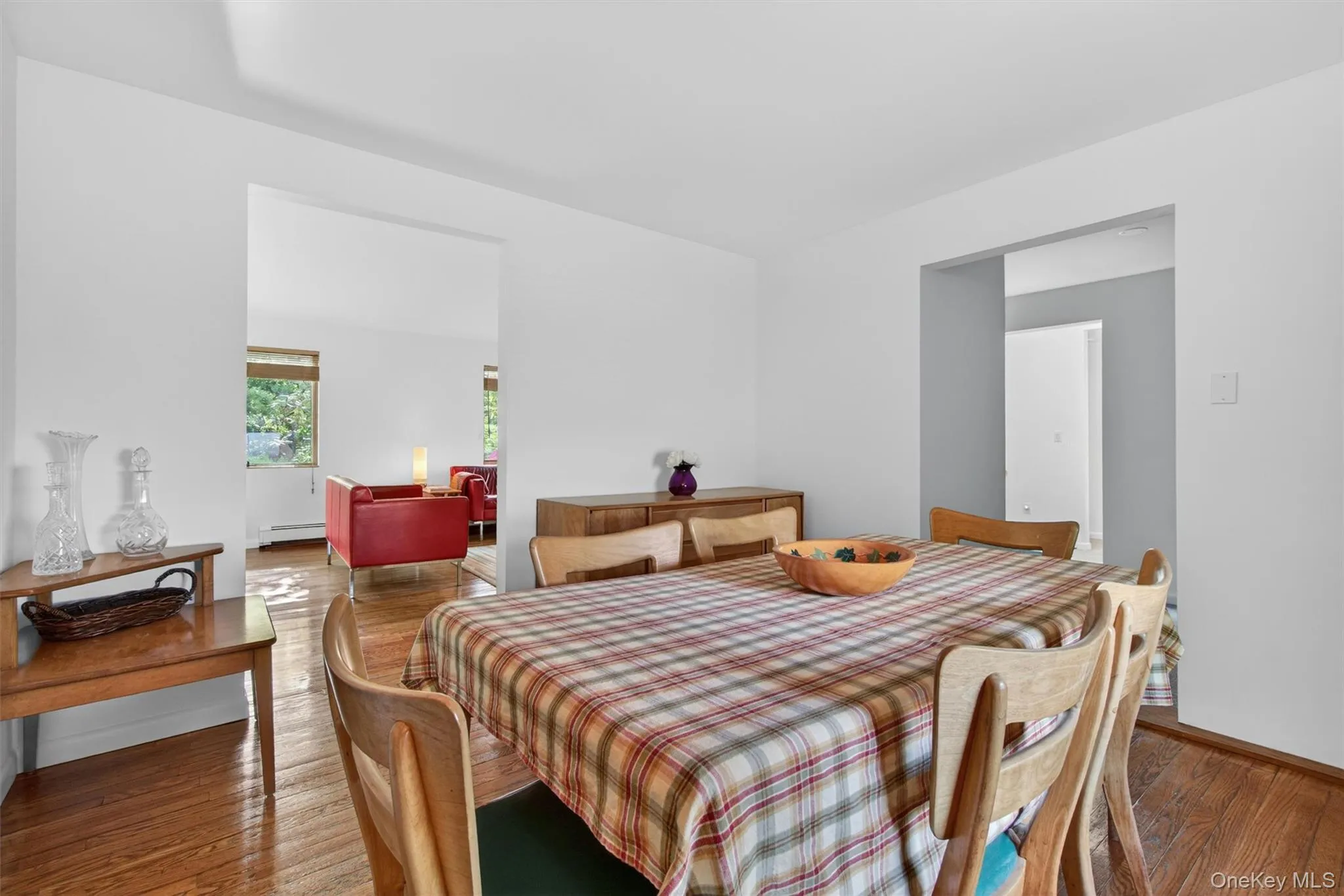 The dining room opens to the living room creating an ideal layout for everyday use and entertaining. The dining room opens to the living room creating an ideal layout for everyday use and entertaining.