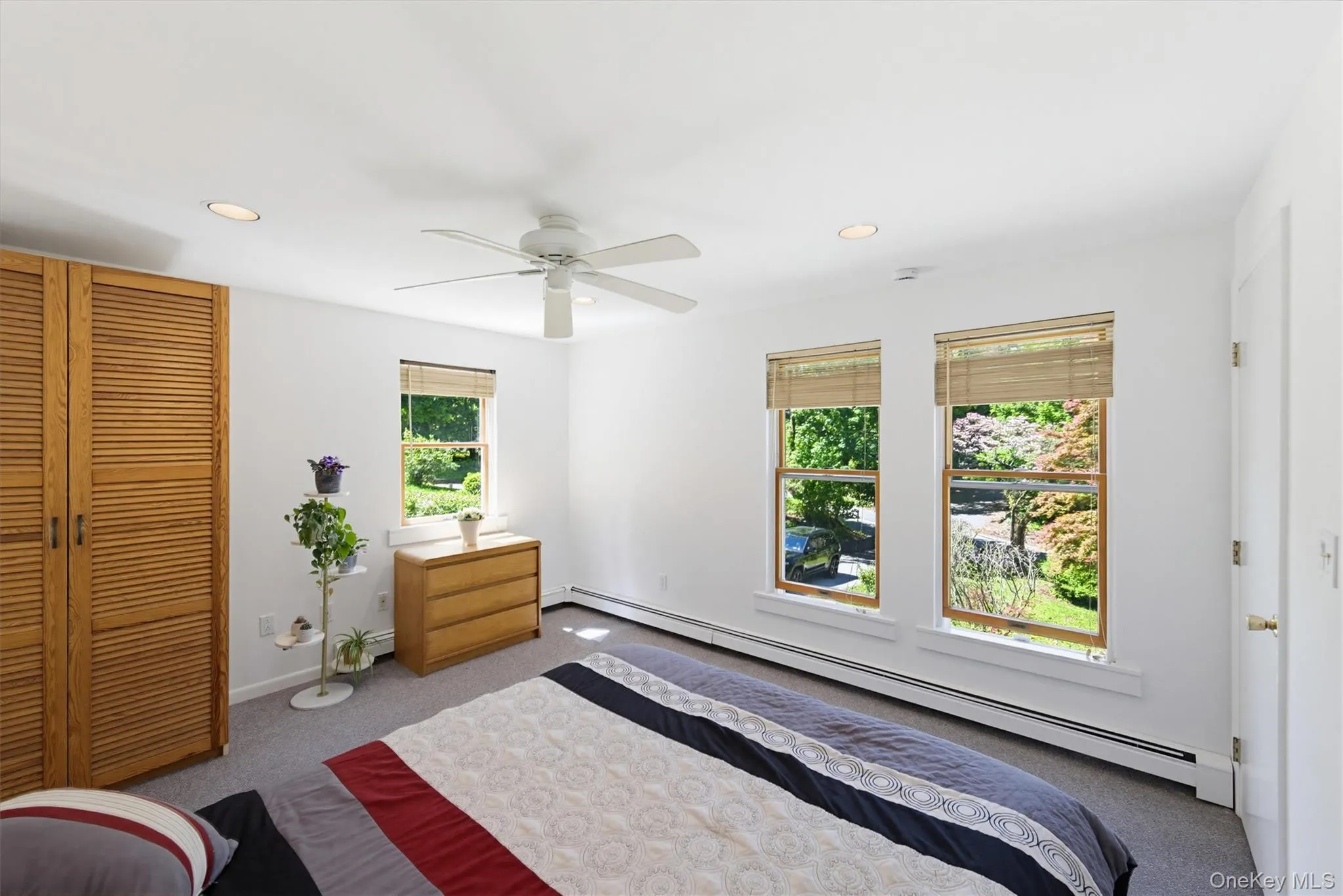 The primary bedroom offers a walk-in closet for excellent storage and functionality. The primary bedroom offers a walk-in closet for excellent storage and functionality.