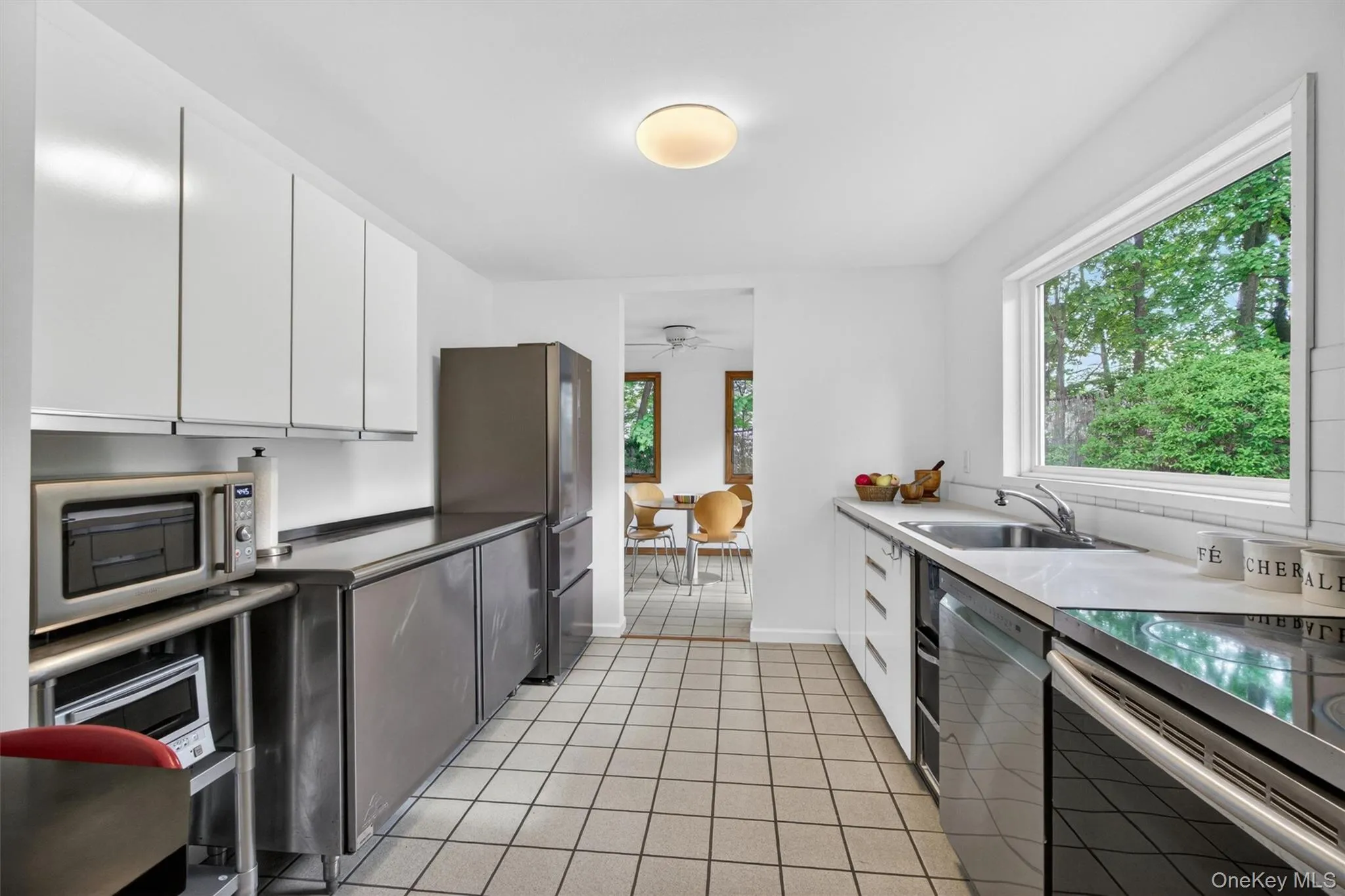 The early modern kitchen features updated appliances. The early modern kitchen features updated appliances.