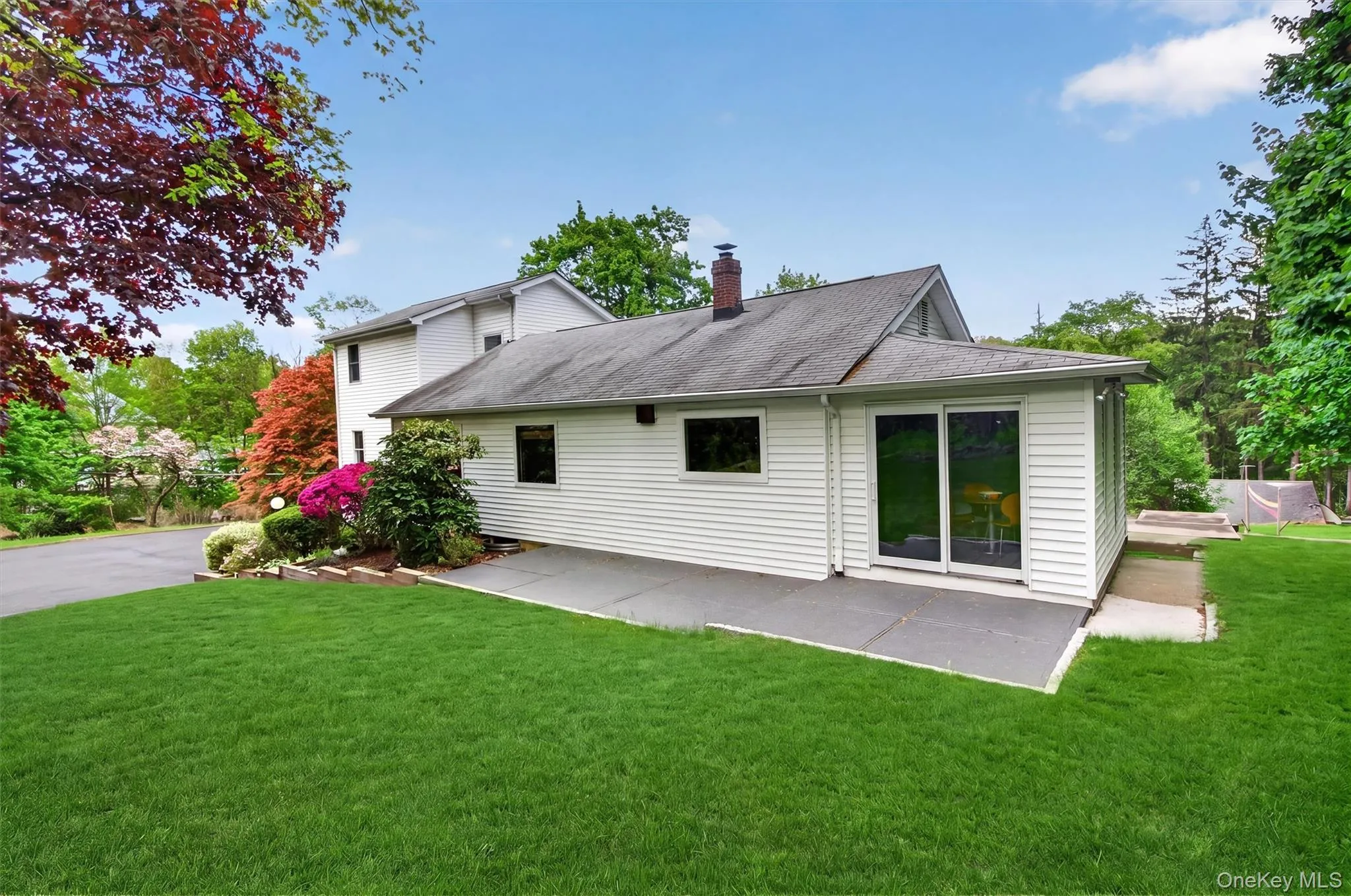 Patio accessible from the breakfast room and overlooking the peaceful yard. Patio accessible from the breakfast room and overlooking the peaceful yard.