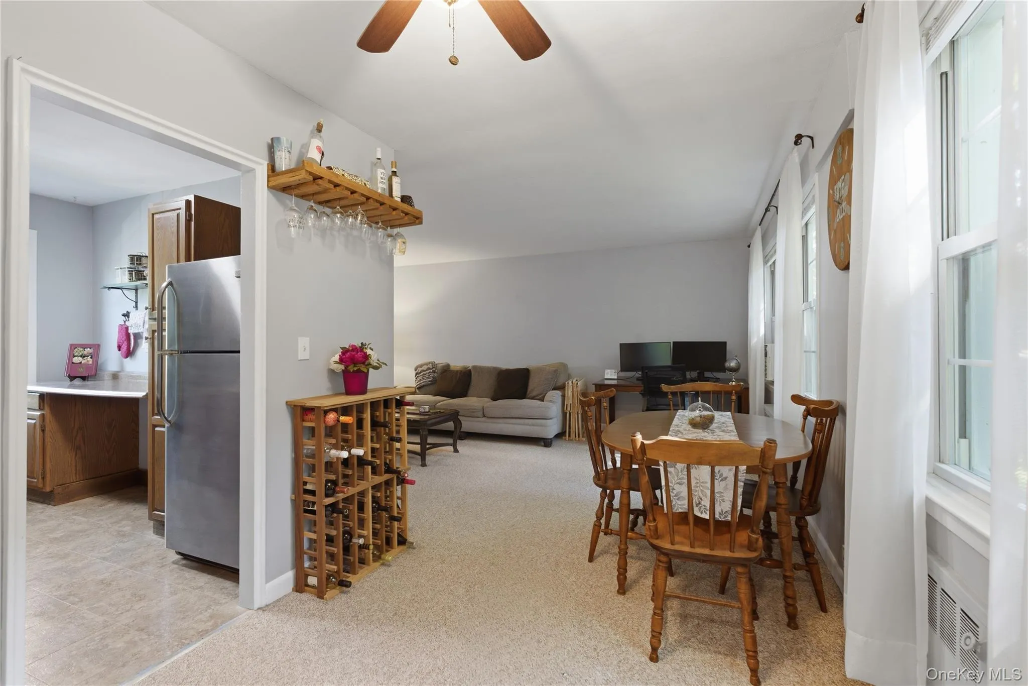 View of dining area/living room and kitchen View of dining area/living room and kitchen