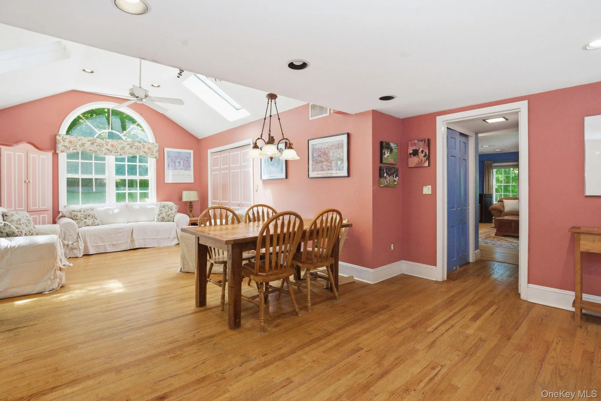 The family room's generous proportions and hardwood floors offer a versatile space with room for both dining and lounging. The family room's generous proportions and hardwood floors offer a versatile space with room for both dining and lounging.