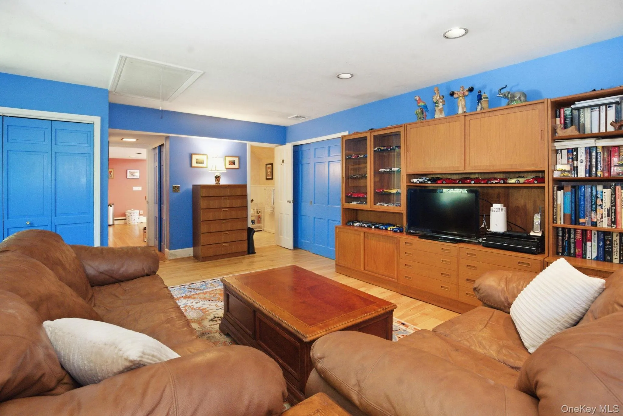 The first-floor primary suite offers recessed lighting, a full ensuite bath, and main-level convenience rarely found in a home of this era. The first-floor primary suite offers recessed lighting, a full ensuite bath, and main-level convenience rarely found in a home of this era.