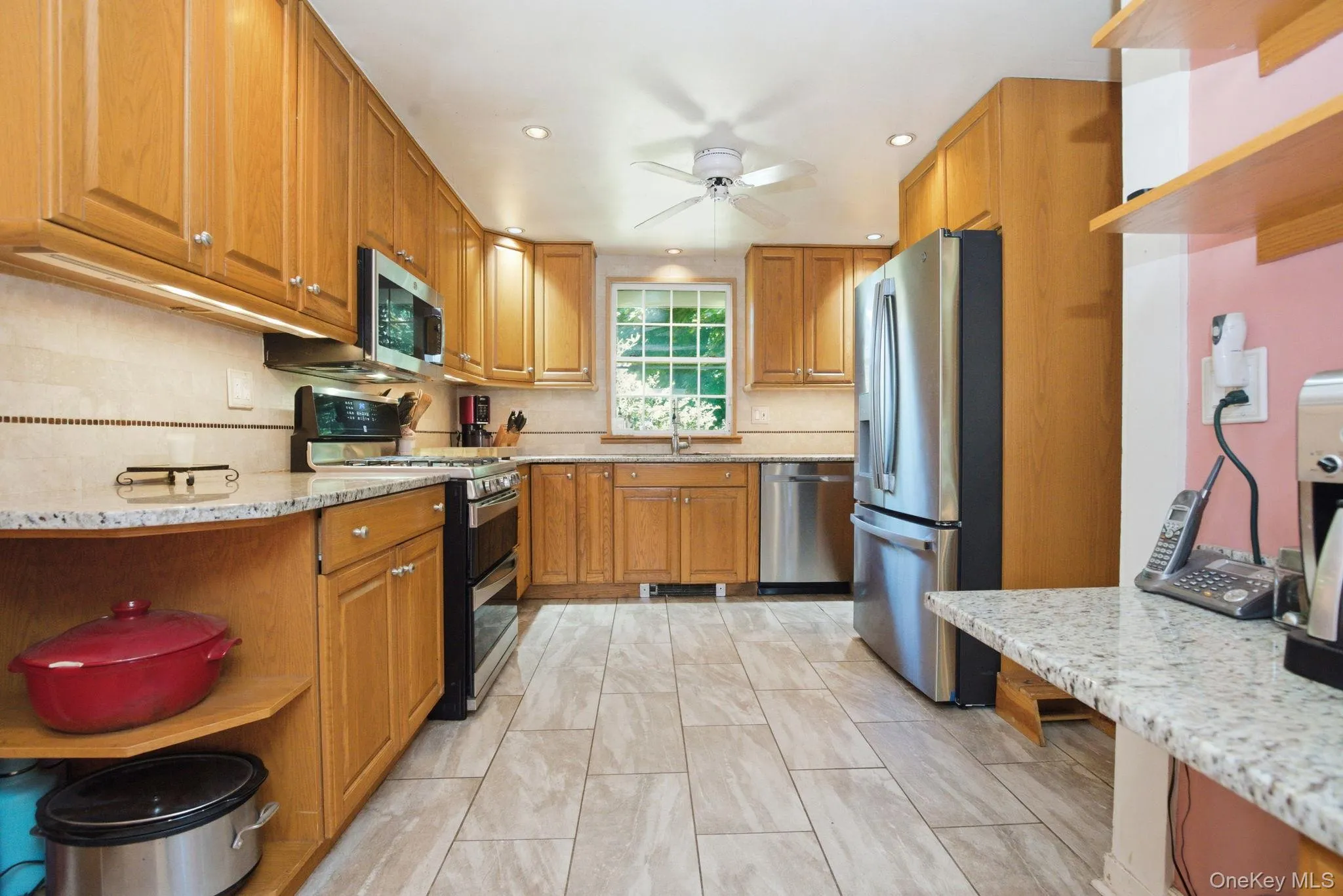 Generous cabinet storage, a full stainless steel appliance suite, and a garden window make this kitchen as functional as it is workable. Generous cabinet storage, a full stainless steel appliance suite, and a garden window make this kitchen as functional as it is workable.