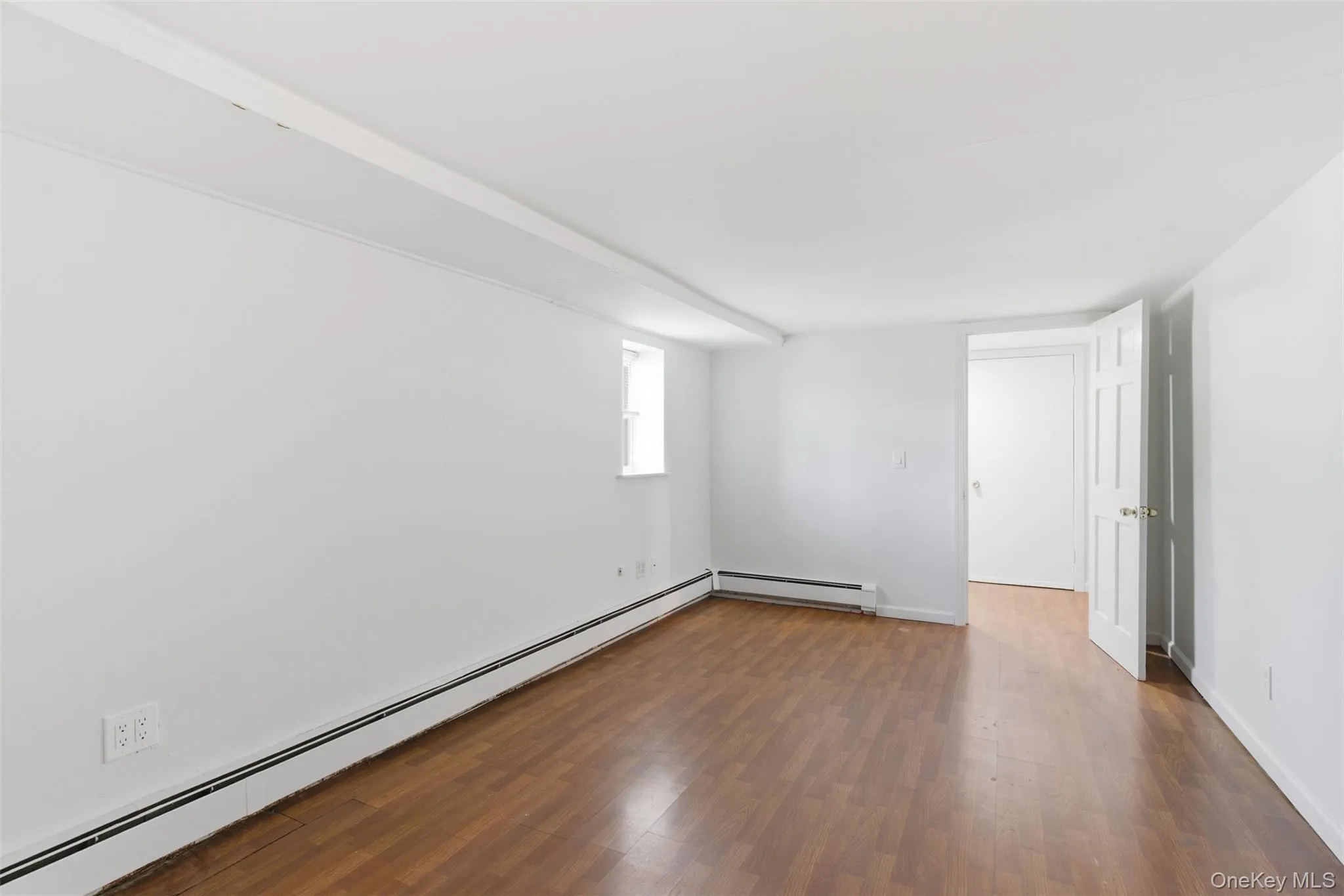 Basement complete with recreation space, storage, utilities, bathroom and outside entrance Basement complete with recreation space, storage, utilities, bathroom and outside entrance