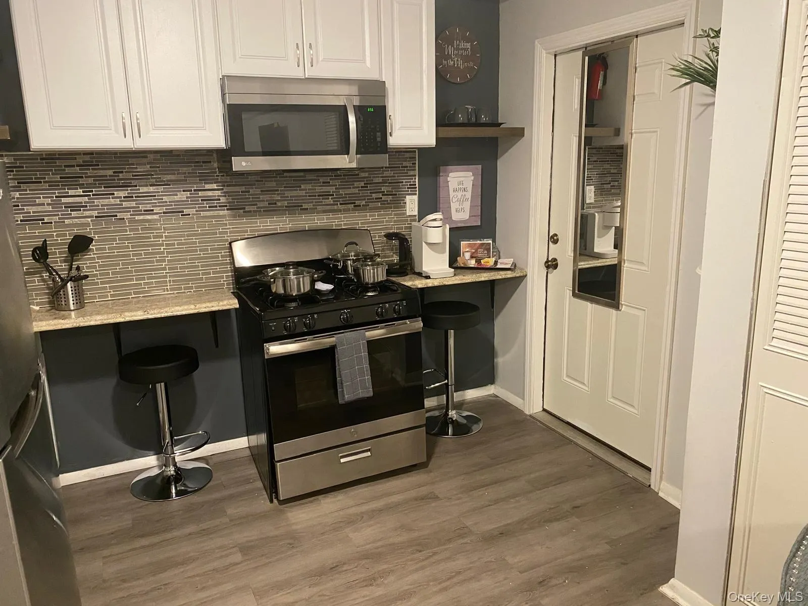Kitchen With Door to Bathroom and Closets Kitchen With Door to Bathroom and Closets