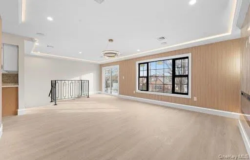 Spacious LIVING room featuring balcony Spacious LIVING room featuring balcony