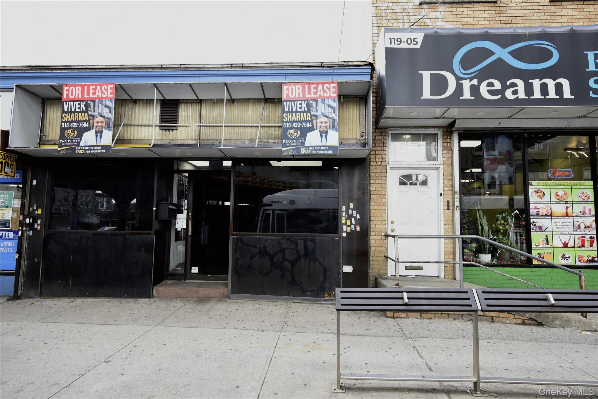 Commercial storefront featuring a recessed entrance and expansive display windows Commercial storefront featuring a recessed entrance and expansive display windows