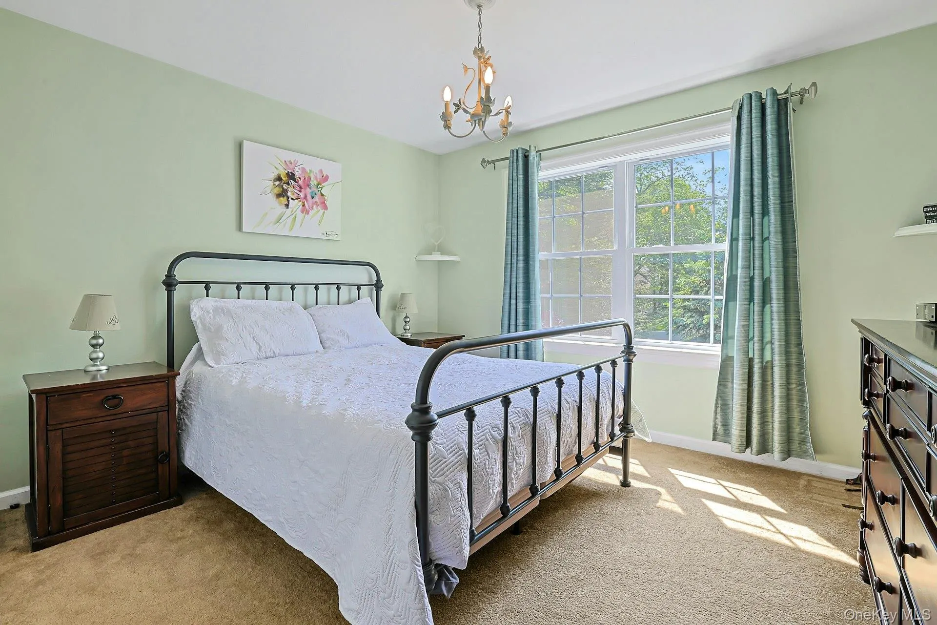 Spacious bedroom with a comfortable layout and plenty of natural light. Spacious bedroom with a comfortable layout and plenty of natural light.