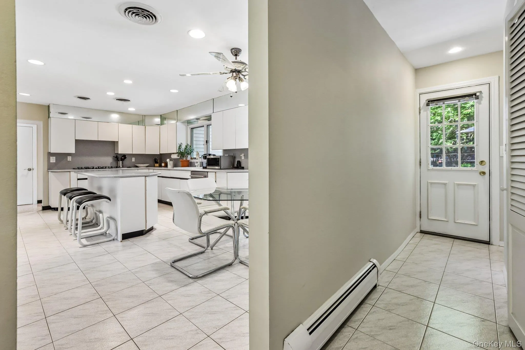 Convenient door to yard from the kitchen Convenient door to yard from the kitchen