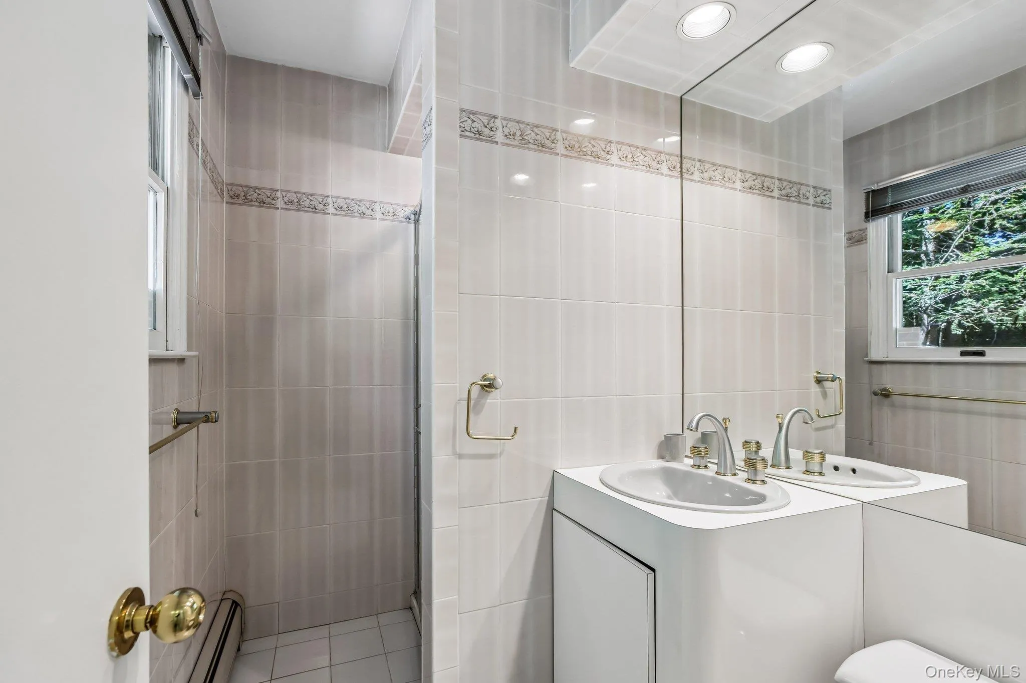 Convenient full bath off the kitchen next to the pool Convenient full bath off the kitchen next to the pool