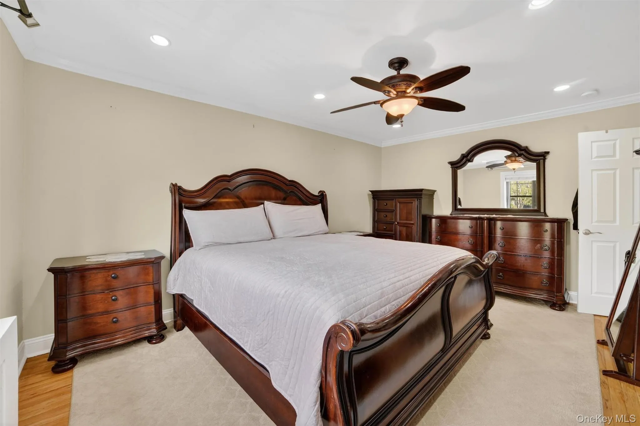 Large primary bedroom with closets Large primary bedroom with closets