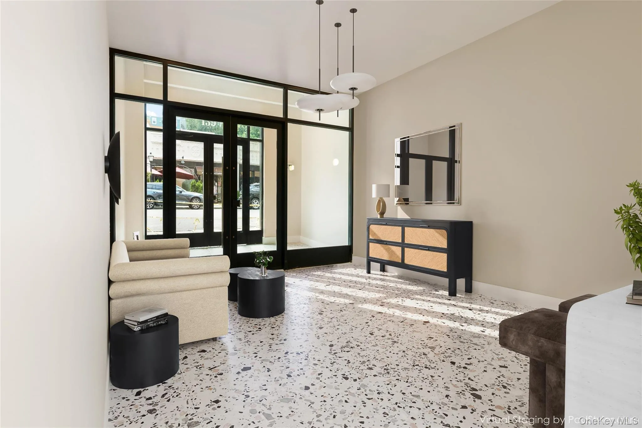 Foyer entrance with speckled floor and baseboards Foyer entrance with speckled floor and baseboards