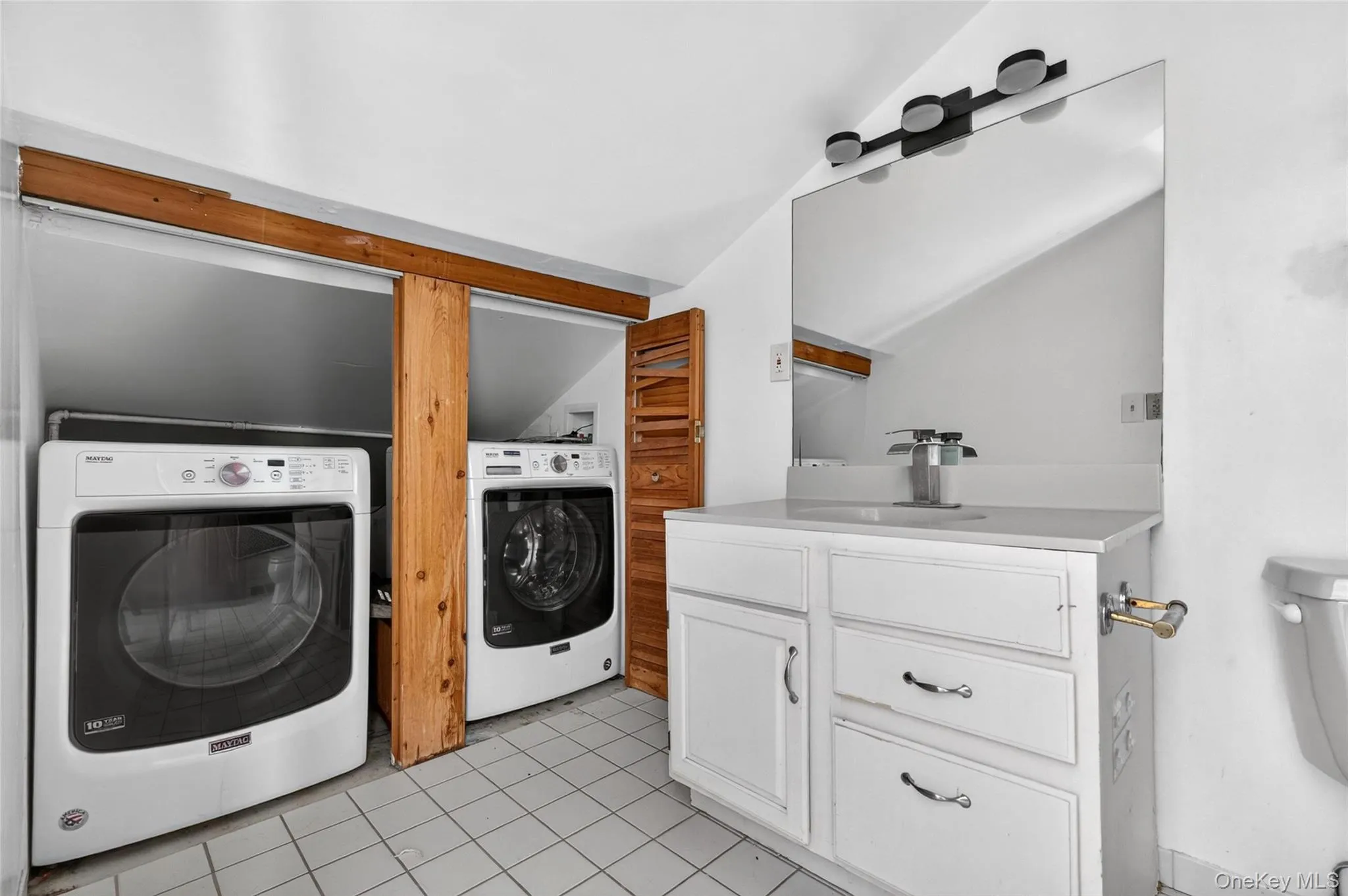 laundry combined with the main full bath laundry combined with the main full bath