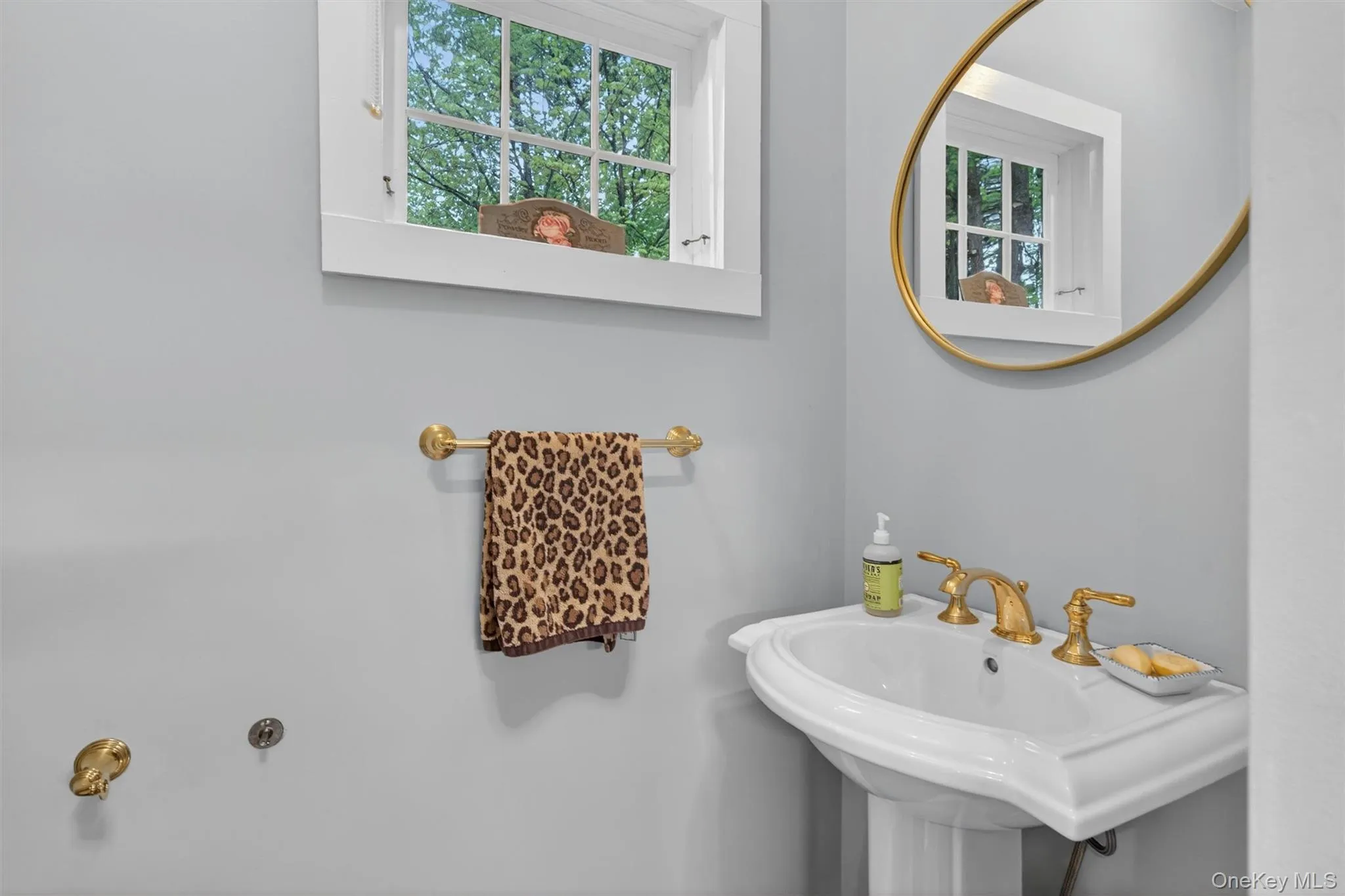 opposite a convenient updated half-bath powder room... opposite a convenient updated half-bath powder room...