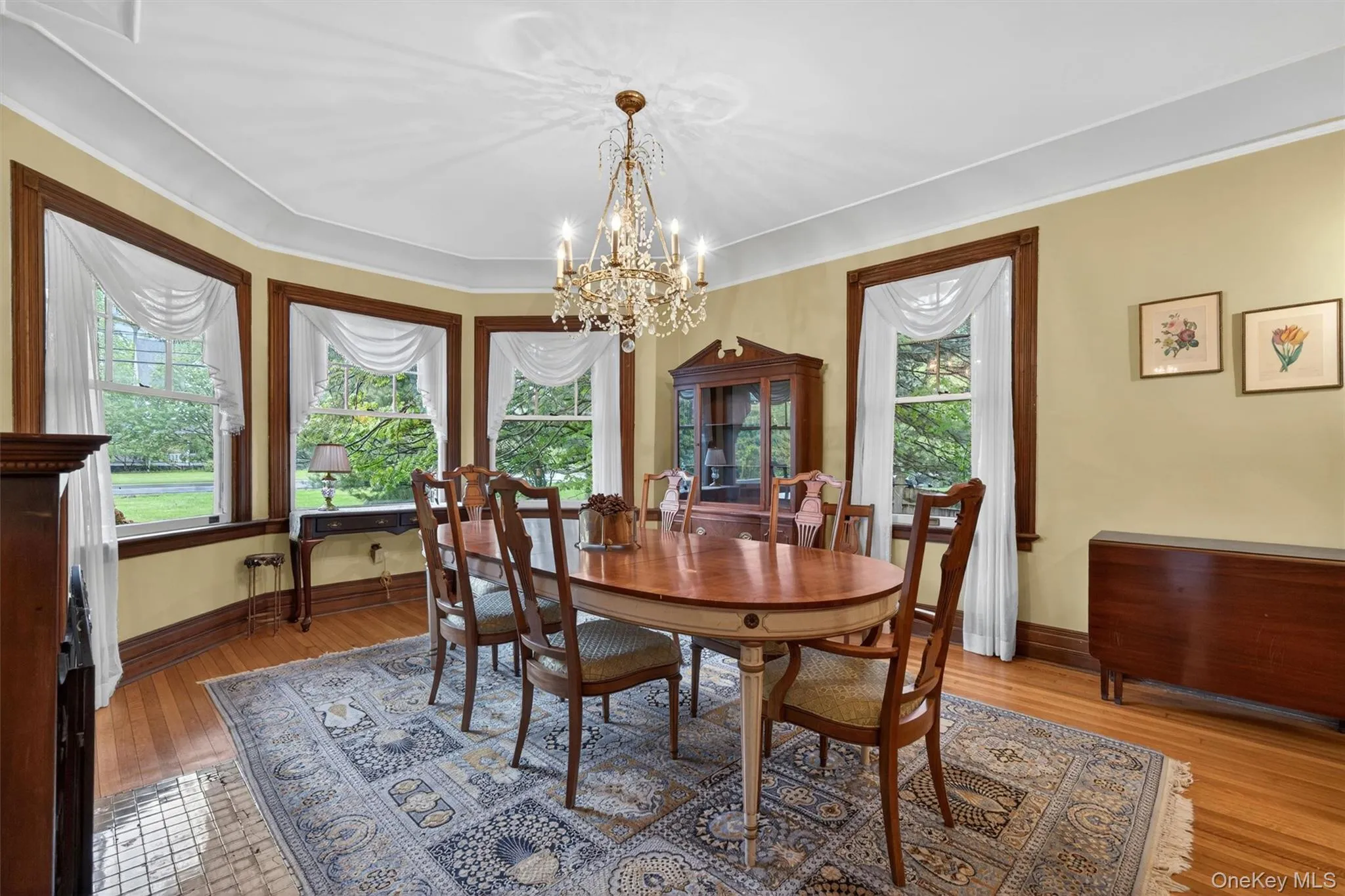 Moving clockwise in the home is a grand formal dining room with pocket doors... Moving clockwise in the home is a grand formal dining room with pocket doors...