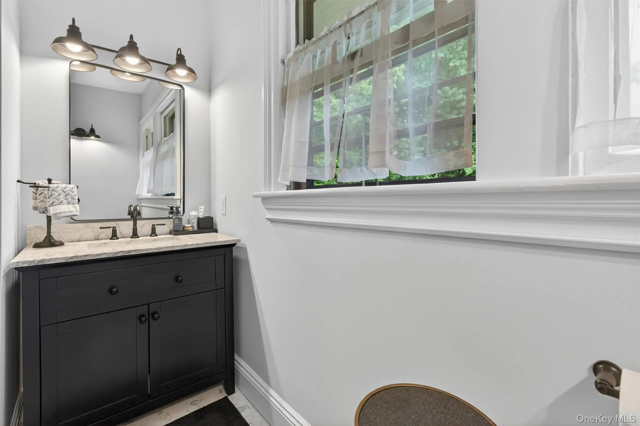 The second floor full bath is also updated and has one sink, a window and ... The second floor full bath is also updated and has one sink, a window and ...