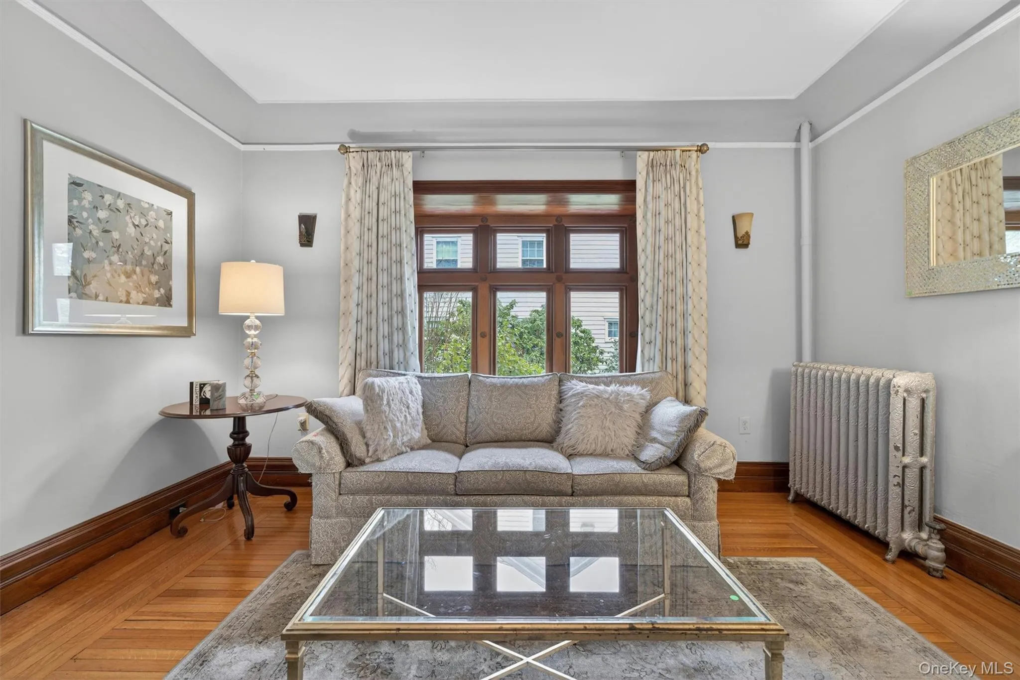 From the back entry, you can also head directly into a spacious living room with built-in recessed window ledge... From the back entry, you can also head directly into a spacious living room with built-in recessed window ledge...