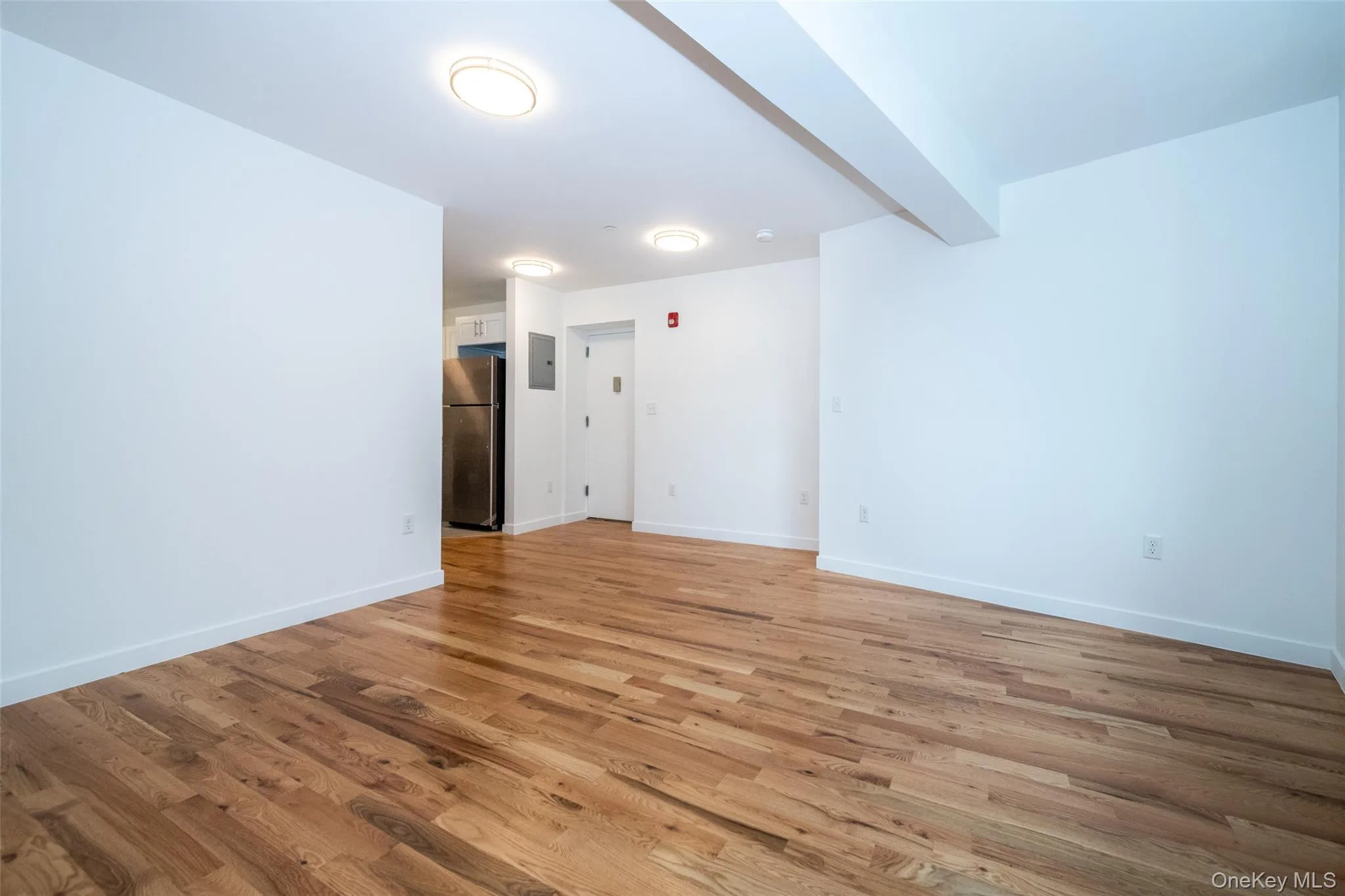 View toward entry and kitchen. View toward entry and kitchen.