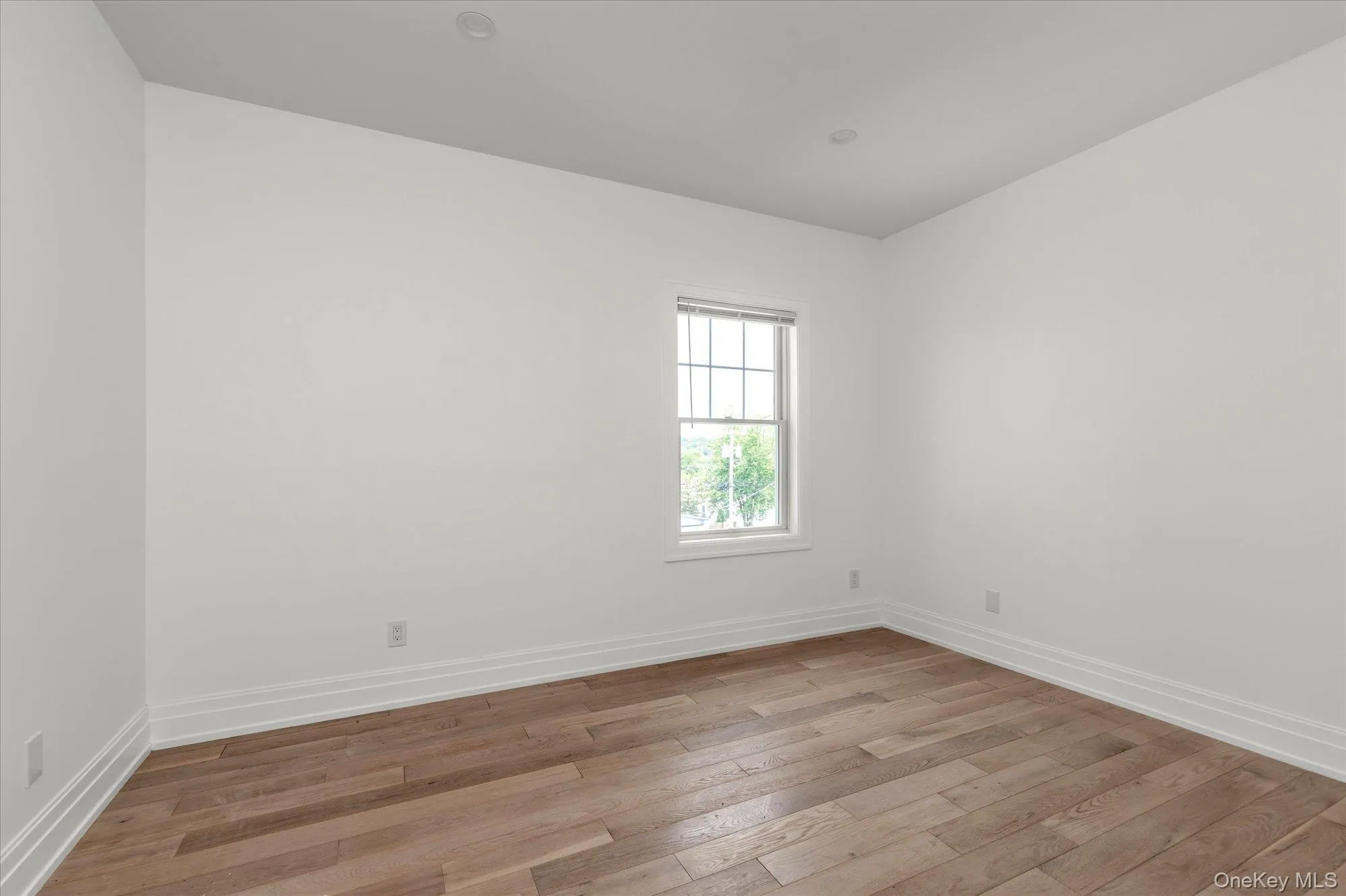 Spacious bedroom with ample closet space Spacious bedroom with ample closet space