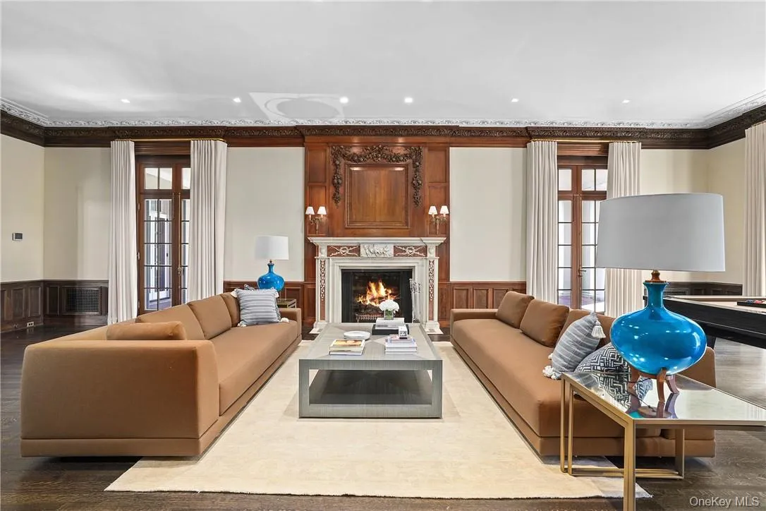 Great Room with Soaring Ceilings and Wood Burning Fireplace Great Room with Soaring Ceilings and Wood Burning Fireplace