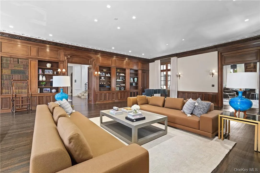 Oversized formal living space with built-ins. Oversized formal living space with built-ins.