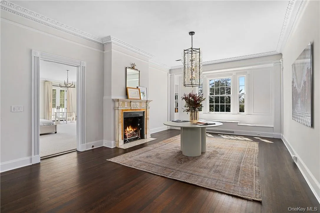 Landing with large fireplace welcomes you to the second floor Landing with large fireplace welcomes you to the second floor