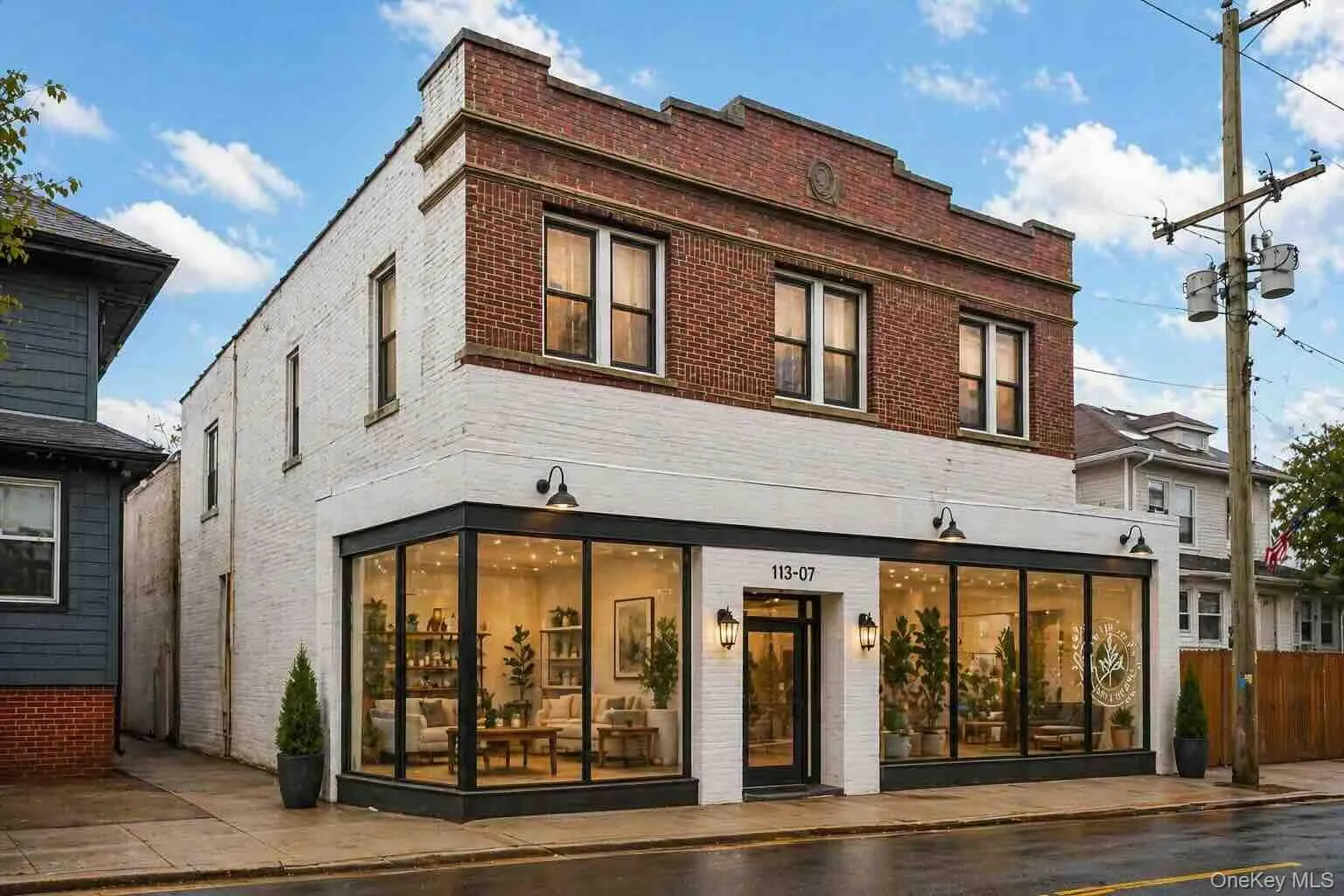 Commercial building featuring a brick and painted brick facade, after repair Commercial building featuring a brick and painted brick facade, after repair