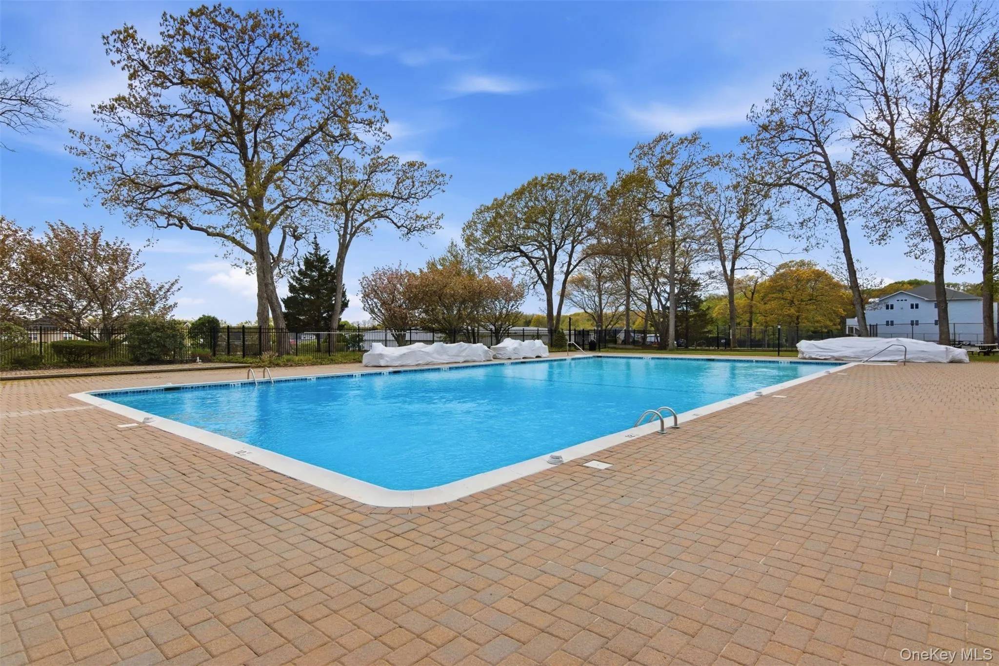 When Pool Opens for Season, its Surrounded by Tables and Lounges When Pool Opens for Season, its Surrounded by Tables and Lounges