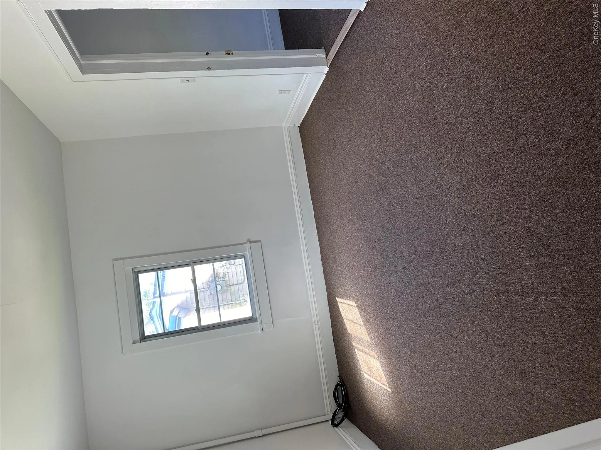 View of carpeted spare room View of carpeted spare room