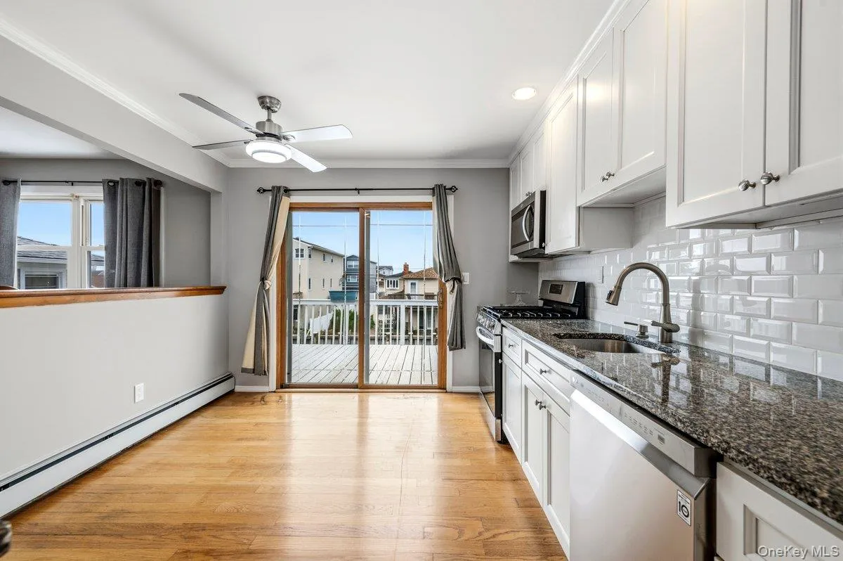 Granite Countertop and Tiled Backsplash Granite Countertop and Tiled Backsplash