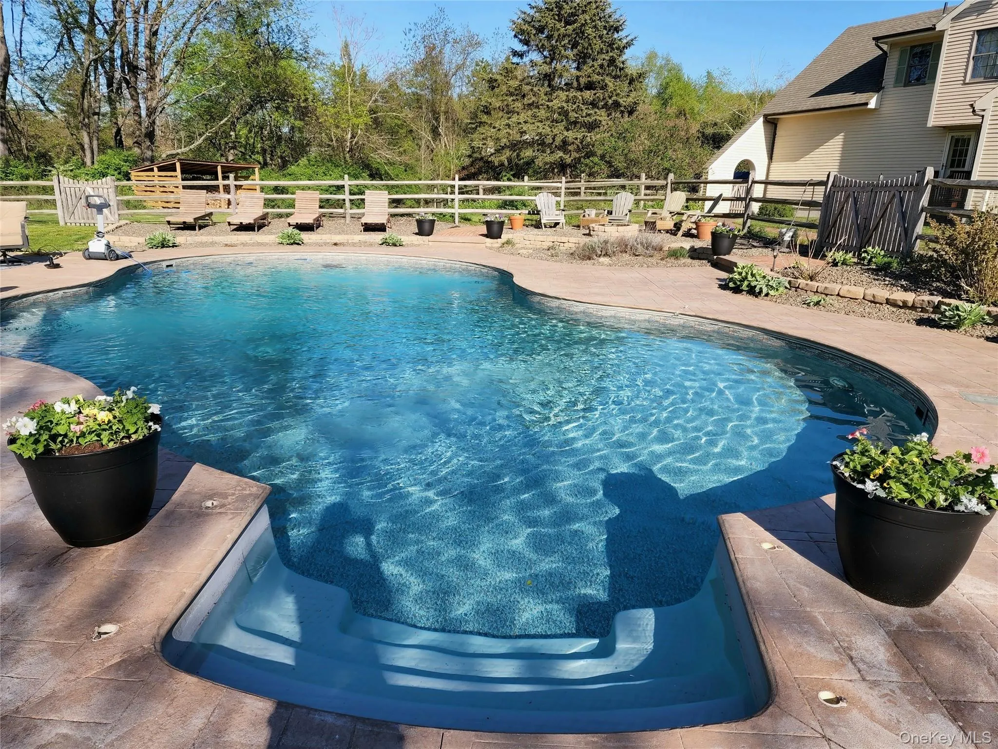 Slip into your lovely pool and enjoy a summer to remember in your own private oasis! Slip into your lovely pool and enjoy a summer to remember in your own private oasis!