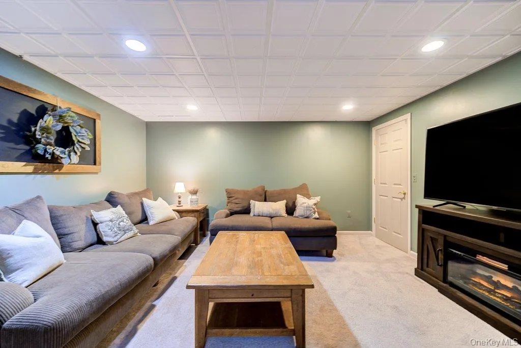 Finished basement den provides another area to relax and enjoy a movie! Finished basement den provides another area to relax and enjoy a movie!