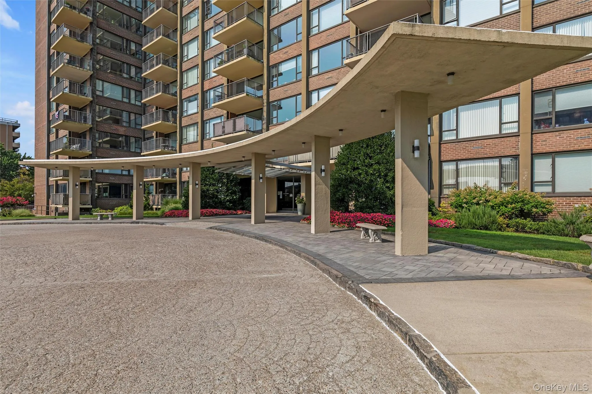 Covered entryway with circular loop for drop off and pick up Covered entryway with circular loop for drop off and pick up