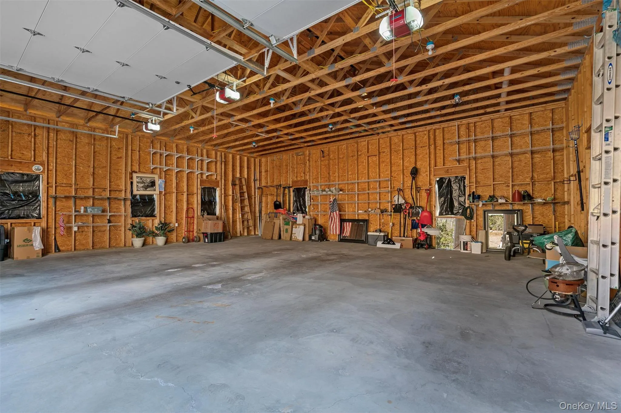 Inside the extra large 3 car detached garage. Inside the extra large 3 car detached garage.