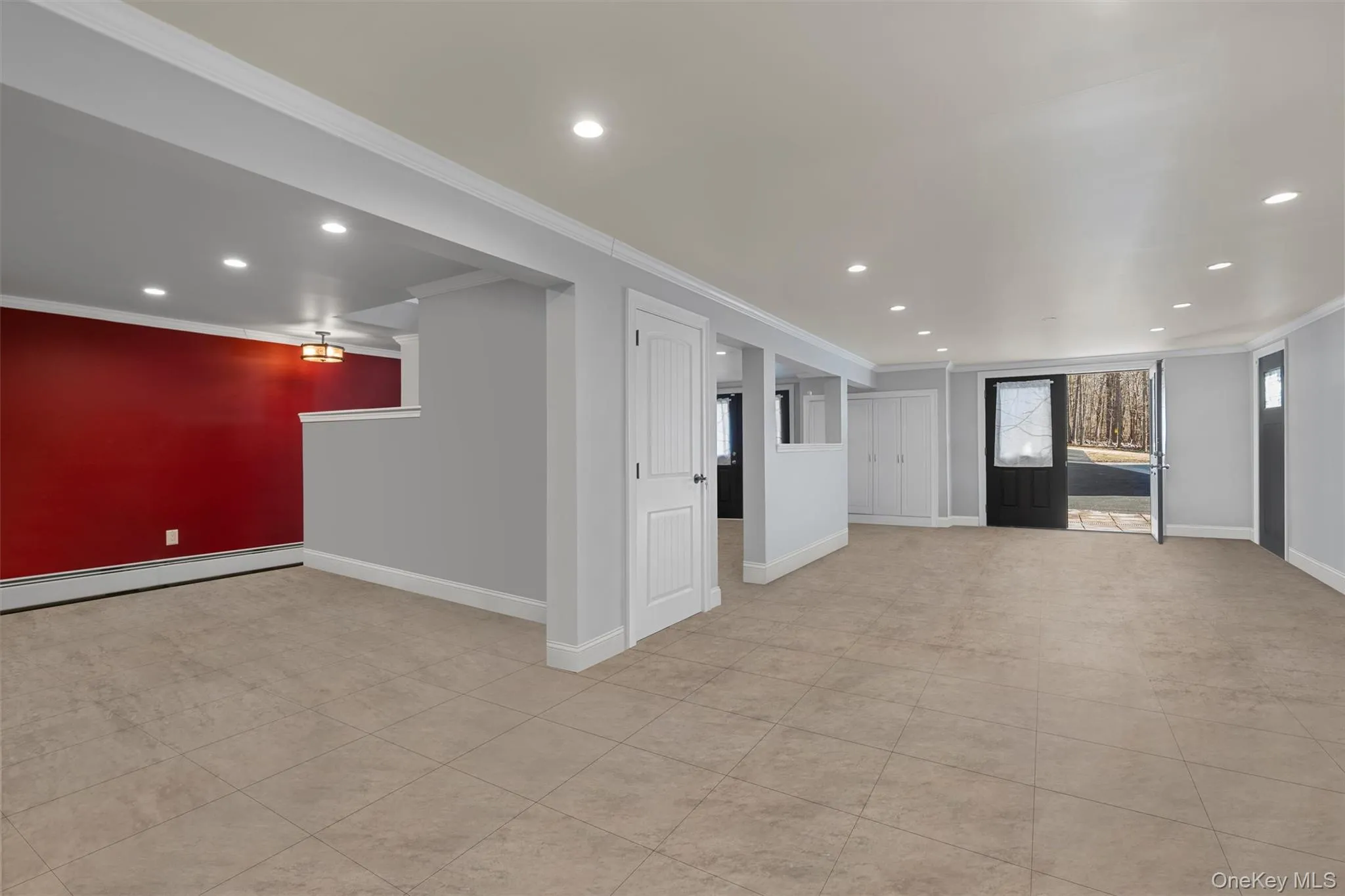 Finished basement (shown with owner's items removed to show the space) Finished basement (shown with owner's items removed to show the space)
