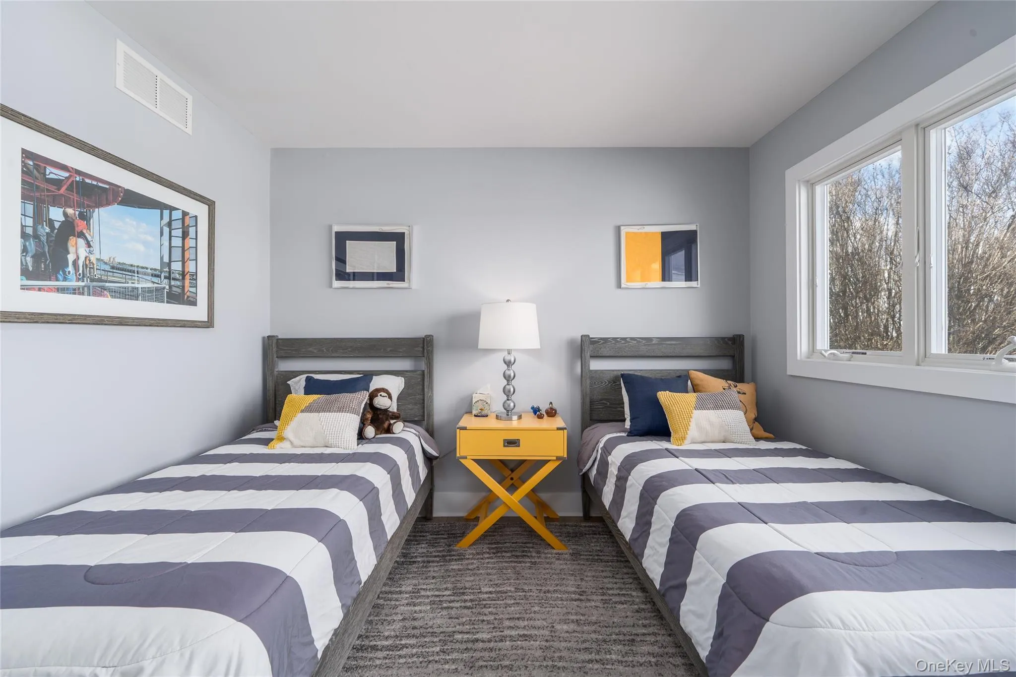 Carpeted bedroom featuring visible vents Carpeted bedroom featuring visible vents