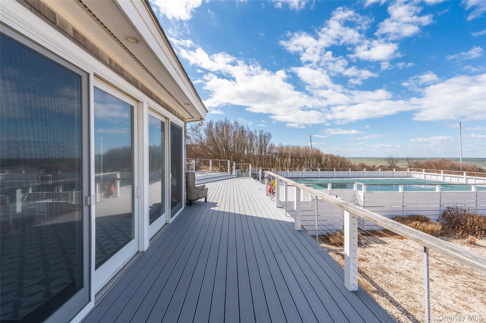 Deck featuring a fenced in pool and fence Deck featuring a fenced in pool and fence