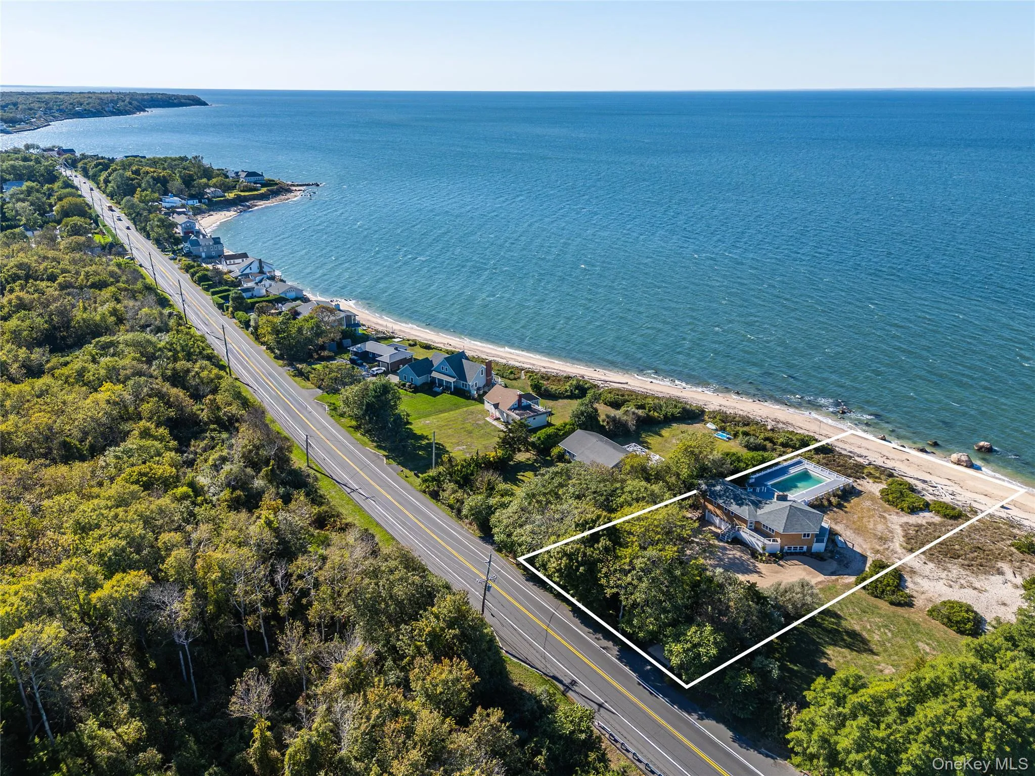 View of property location featuring property parcel outlined and a nearby body of water View of property location featuring property parcel outlined and a nearby body of water