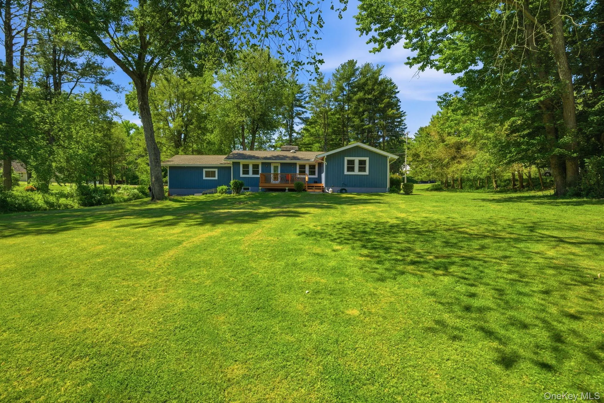 Towering mature trees wrap the rear of the property, giving the whole setting a tucked-away, this-is-ours kind of seclusion. Towering mature trees wrap the rear of the property, giving the whole setting a tucked-away, this-is-ours kind of seclusion.