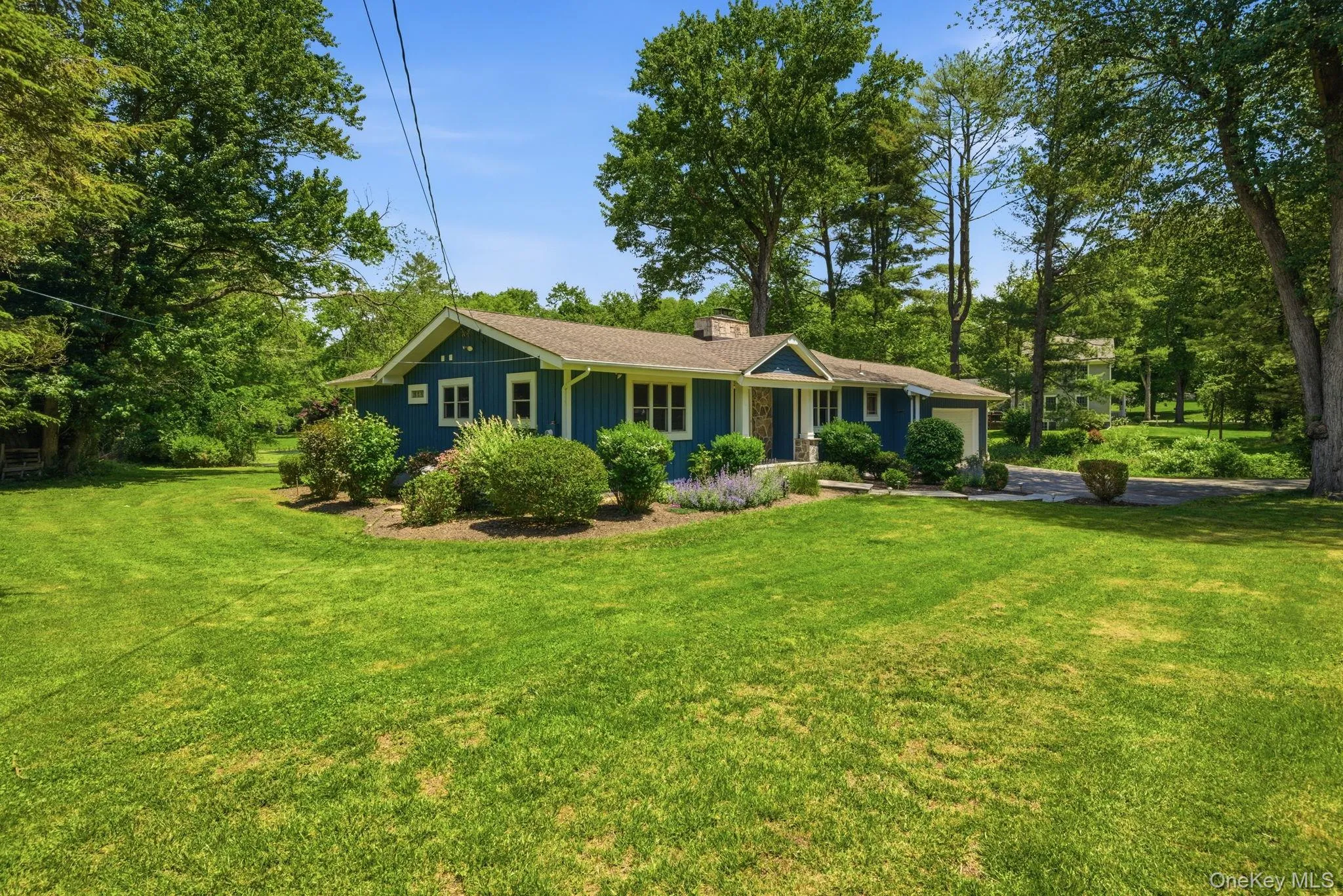 Classic ranch character meets timeless curb appeal, framed by mature trees on one of Somers' prettiest, most private lots. Classic ranch character meets timeless curb appeal, framed by mature trees on one of Somers' prettiest, most private lots.