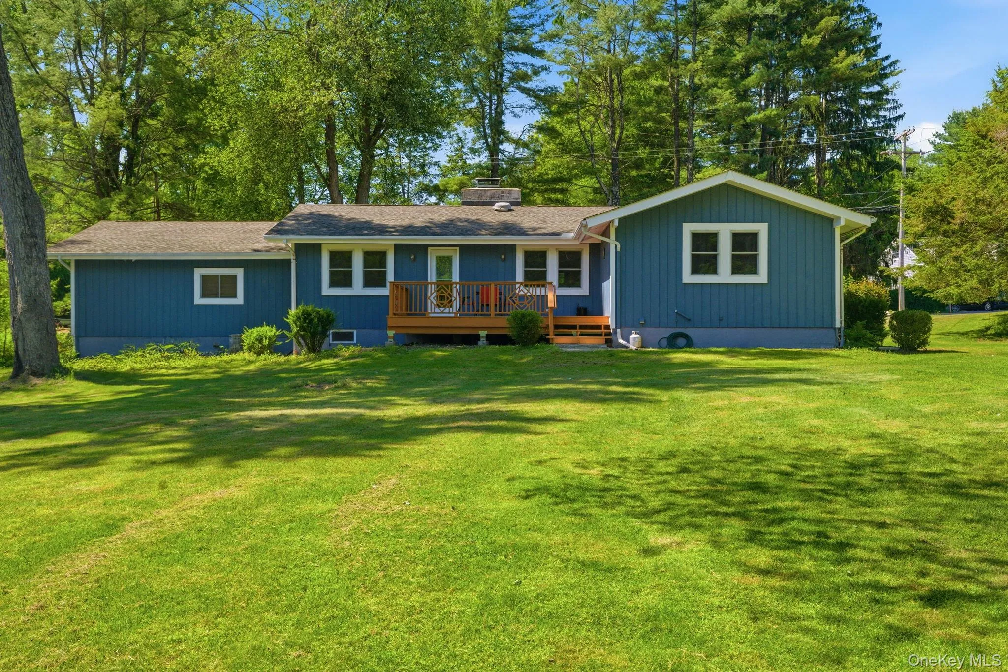 Straight on, you can read the full footprint of this updated ranch, low and effortless with everything living on one level. Straight on, you can read the full footprint of this updated ranch, low and effortless with everything living on one level.