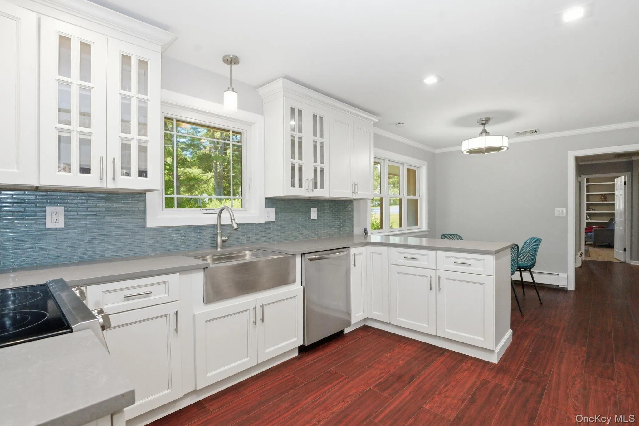 New windows, including an awning window that cranks open to the breeze, pour natural light over your fully renovated kitchen. New windows, including an awning window that cranks open to the breeze, pour natural light over your fully renovated kitchen.