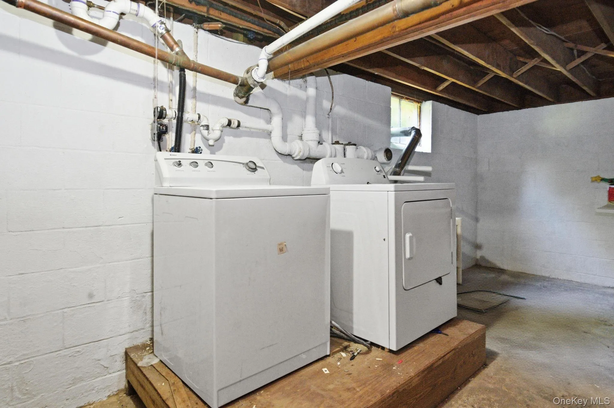 Generous unfinished storage with surprising ceiling height adds laundry, workshop, and storage potential with room to make it your own. Generous unfinished storage with surprising ceiling height adds laundry, workshop, and storage potential with room to make it your own.