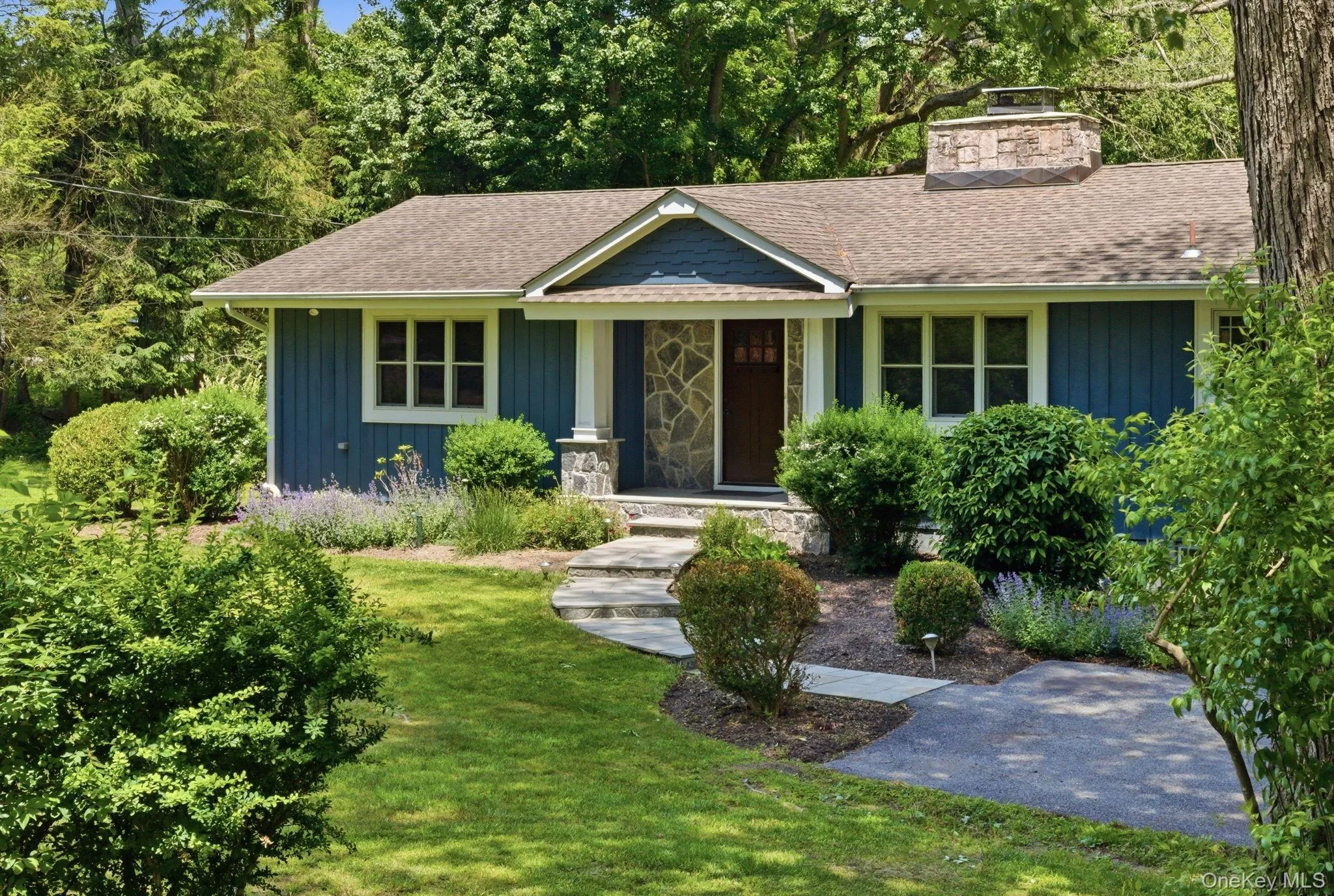 Surrounded by greenery and mature trees, this Deans Pond home feels like a private retreat just minutes from town. Surrounded by greenery and mature trees, this Deans Pond home feels like a private retreat just minutes from town.