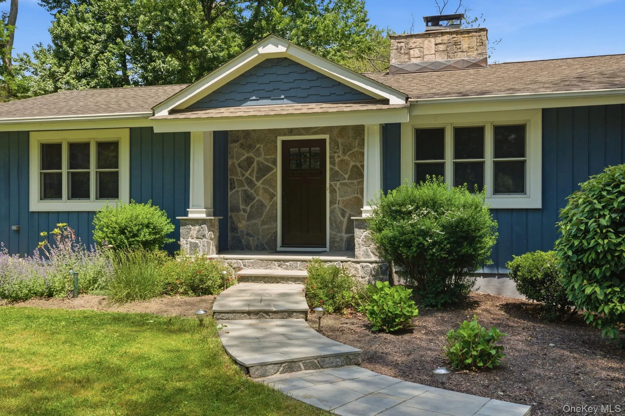 Storybook stone steps and a covered front porch make for a warm, inviting first impression. Storybook stone steps and a covered front porch make for a warm, inviting first impression.