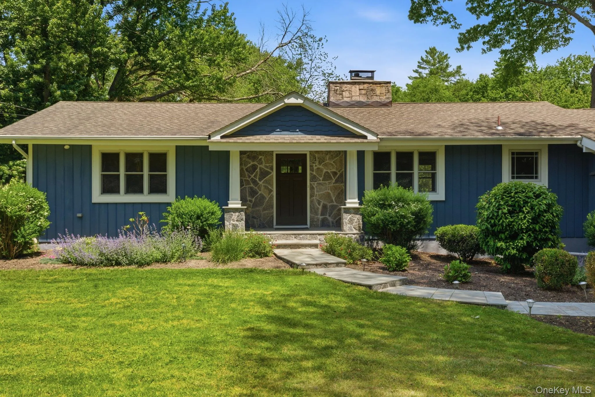 A handsome stone entry and freshly painted facade set the tone the moment you arrive. A handsome stone entry and freshly painted facade set the tone the moment you arrive.