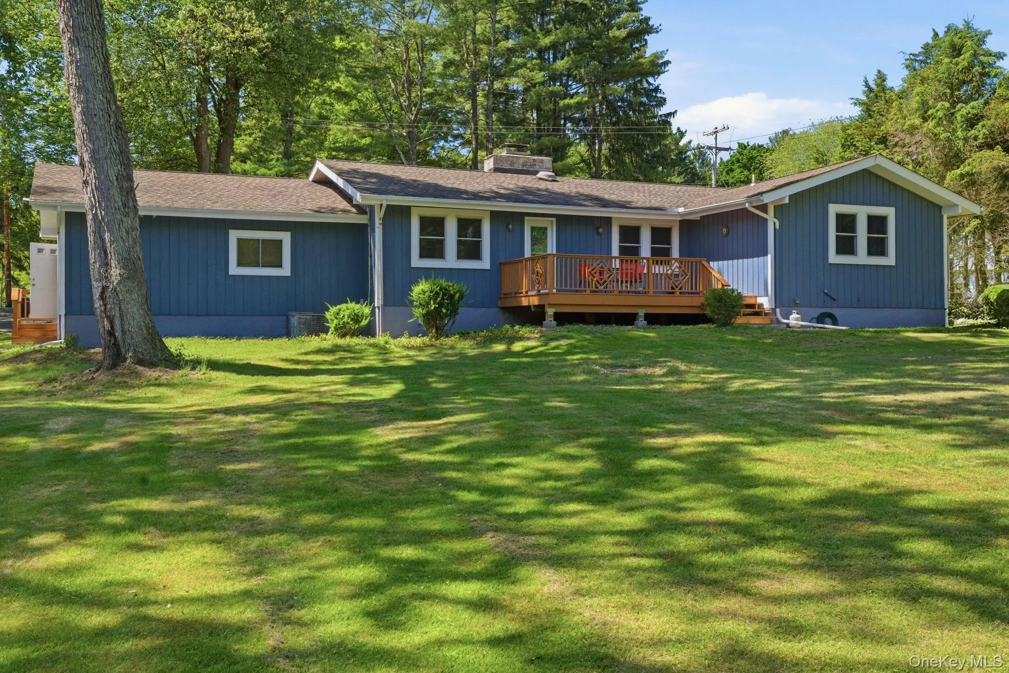 The deck sits right off the back of the home, the natural spot to gather, unwind, and watch the long Somers evenings stretch out in front of you. The deck sits right off the back of the home, the natural spot to gather, unwind, and watch the long Somers evenings stretch out in front of you.