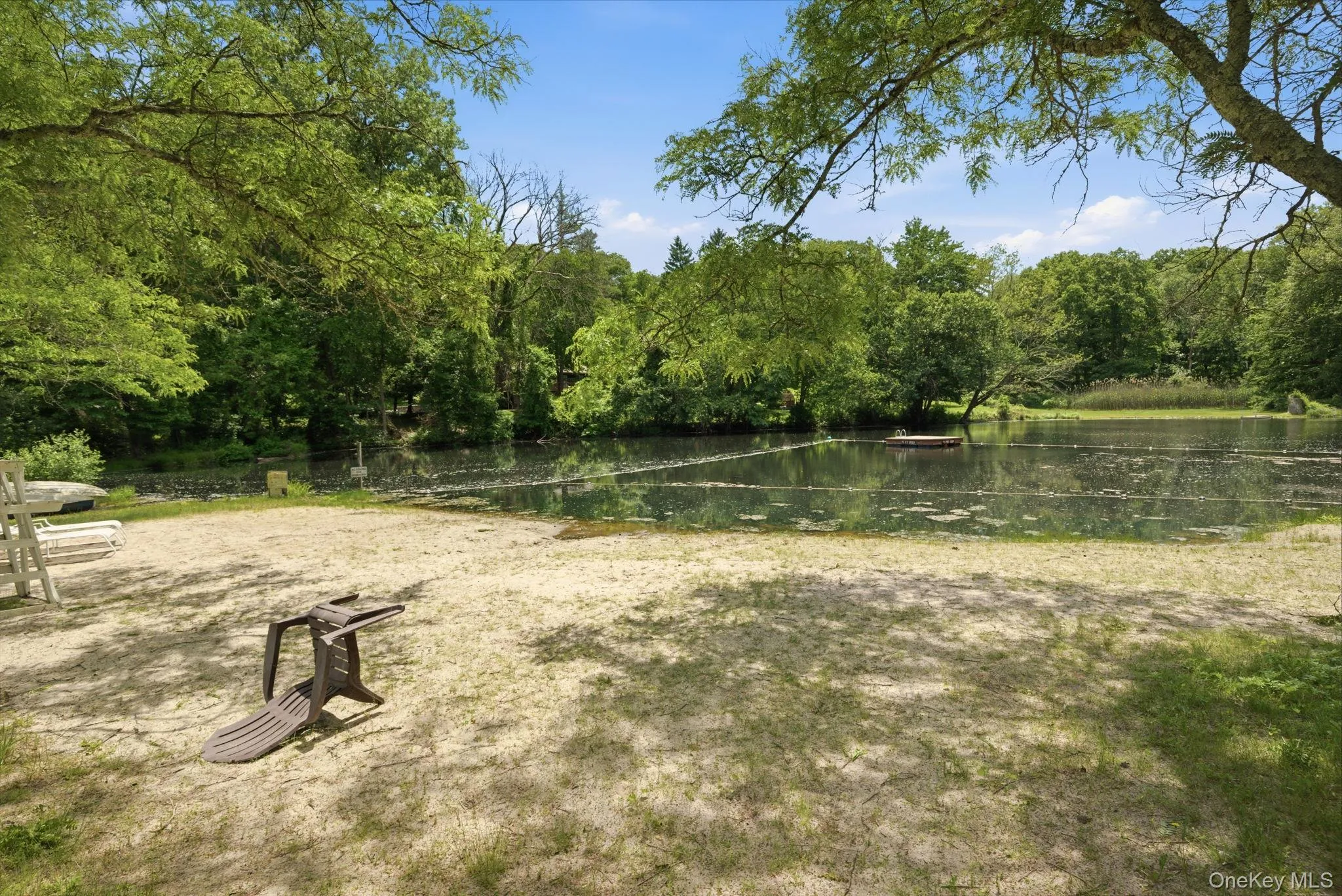 Tree-ringed and quiet, the members' Deans Pond opens up for swimming, fishing, and lazy afternoons drifting out to the dock, the kind of summer that feels like it belongs to another era. Tree-ringed and quiet, the members' Deans Pond opens up for swimming, fishing, and lazy afternoons drifting out to the dock, the kind of summer that feels like it belongs to another era.