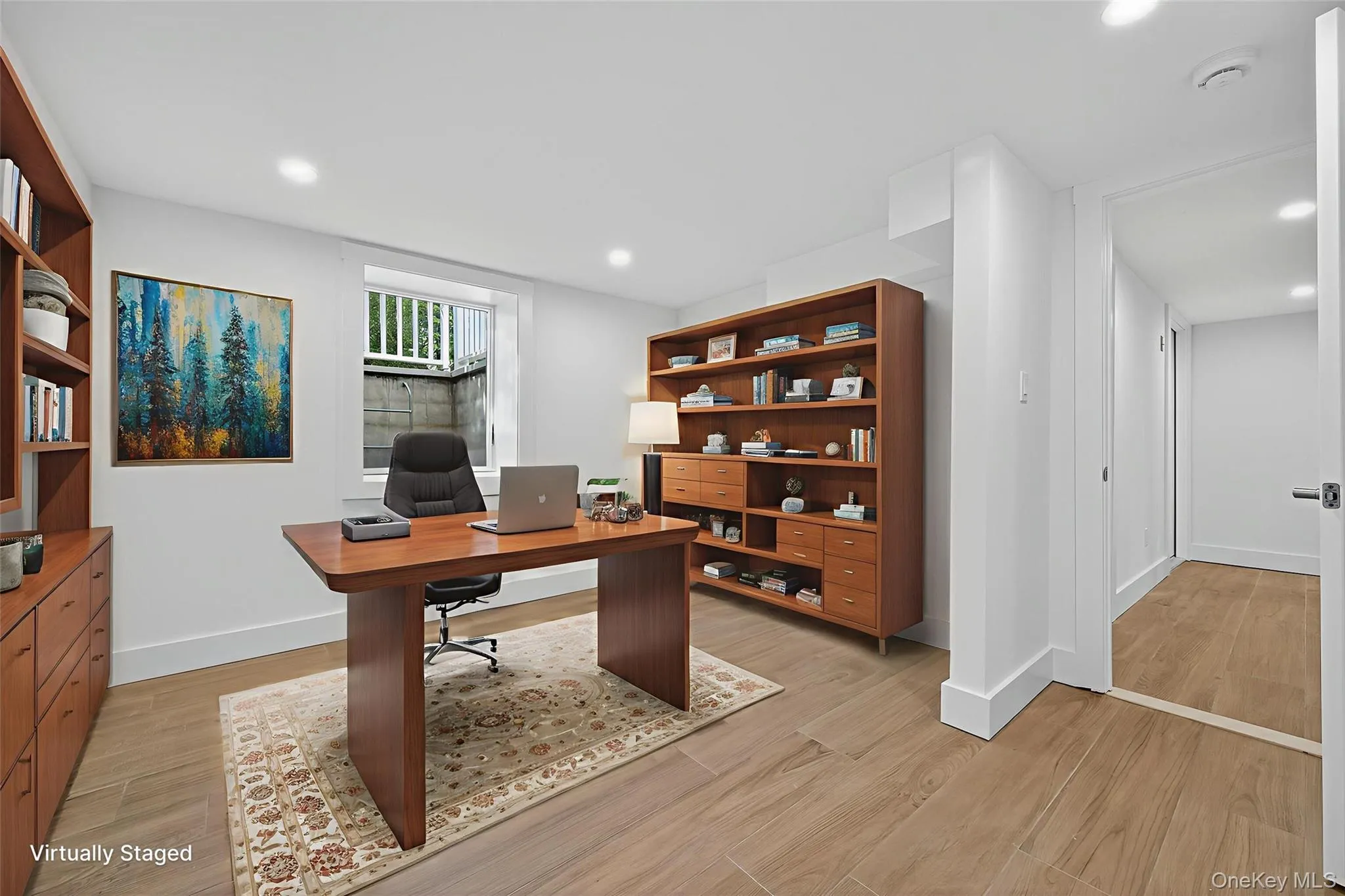 Office area featuring light wood-style flooring and recessed lighting Office area featuring light wood-style flooring and recessed lighting